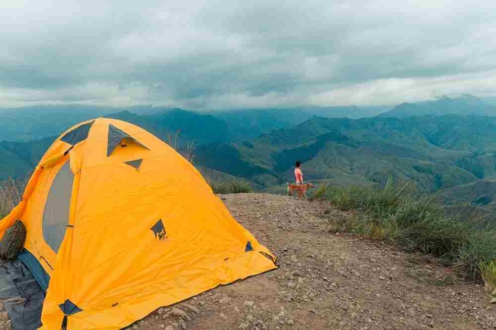 Camping adventure with Dogra Holidays amid scenic mountains, peaceful valleys, and beautiful Himalayan landscapes in India.