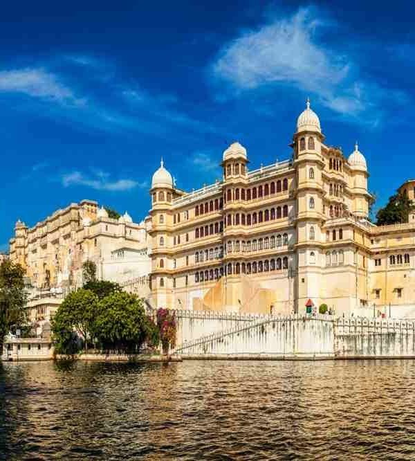 City Palace Udaipur overlooking Lake Pichola, a magnificent heritage palace in Rajasthan.